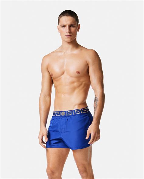 versace men swimming trunks blue with medusa|Greca Border Swim Trunks Blue .